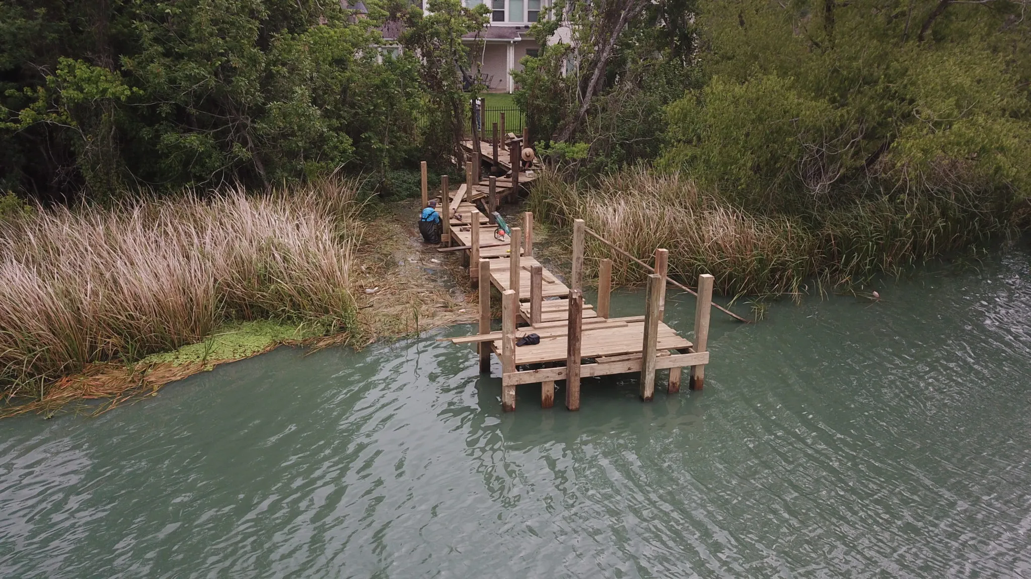 custom built dock utilizing pressure treated lumber and pilings from american pole & timber