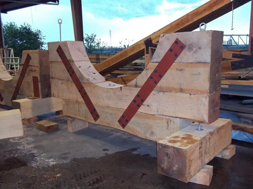 Wood tank saddles on steel supports