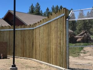alpine zoo gun barrel pilings in crown fence 2