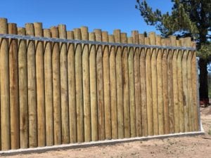 alpine zoo gun barrel pilings in crown fence