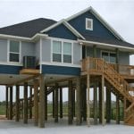 beach house gun barrel pilings finished BIG