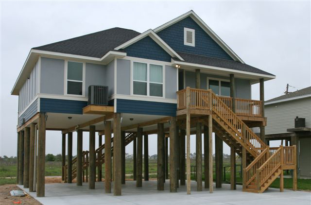 beach house gun barrel pilings finished BIG