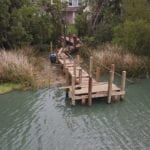 Custom built dock utilizing pressure treated lumber and pilings from American Pole & Timber