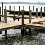 Dock and pier built with pressure treated pilings for marine use.