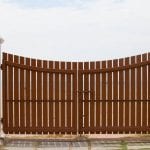 wooden gate with sea background