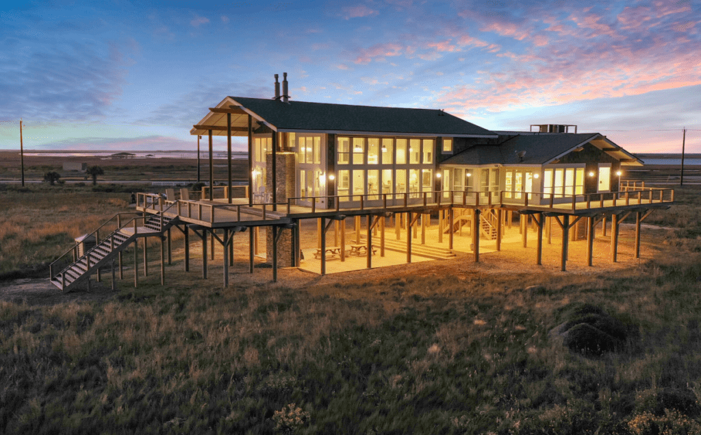gun barrel pilings agee house night 2024
