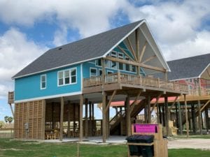 gun barrel pilings and timber truss beach home 2