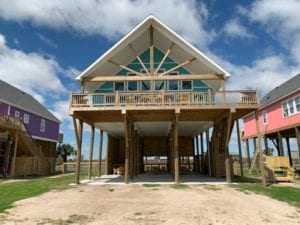 gun barrel pilings beach home walz family builders and manley