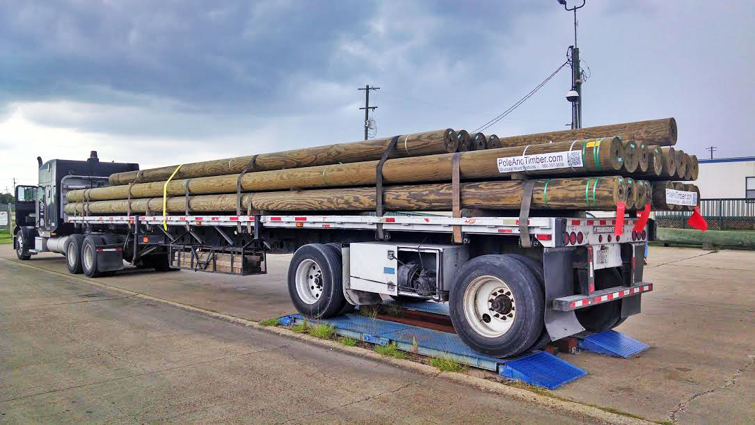 gun barrel pilings on trailer